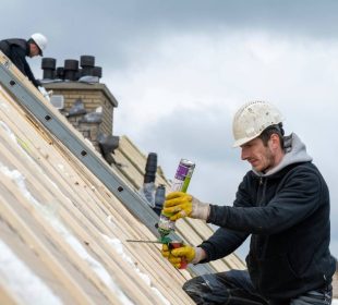 Roofing team working at height