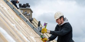 Roofing team working at height