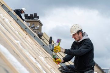 Roofing team working at height