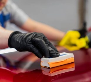 man-worker-of-car-detailing-studio-applying-cerami-2021-08-29-11-02-37-utc-1-905x613